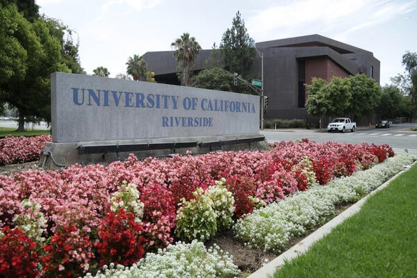 Sign in front of campus, reads University of California Riverside.